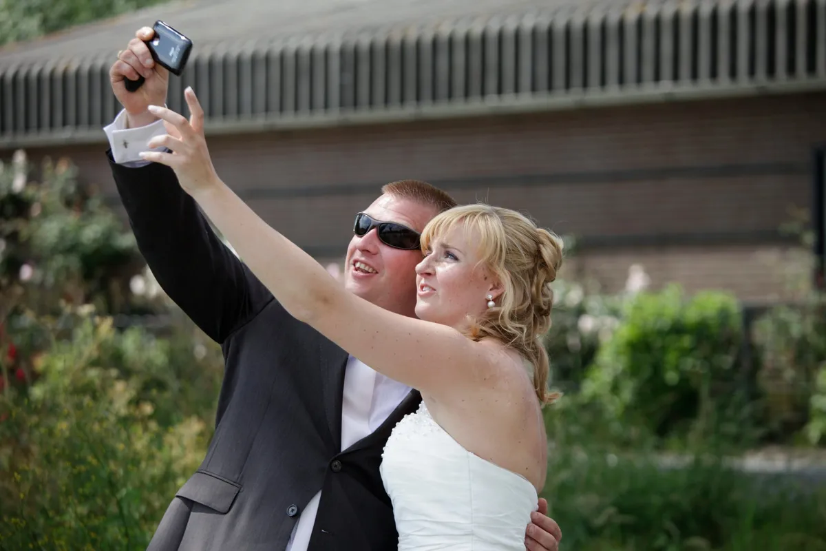 Alex maakt een selfie van hen samen