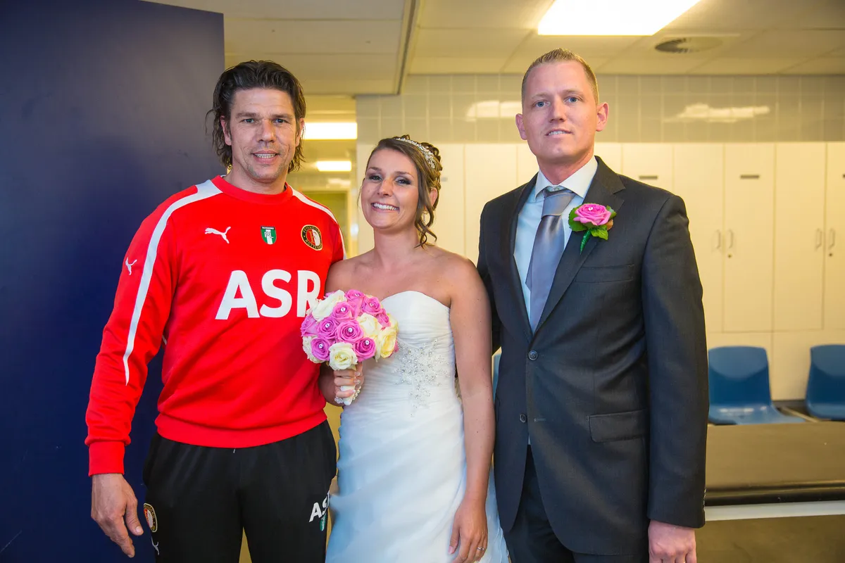 Michelle en Sven met een speler van Feyenoord