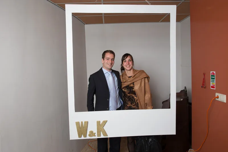 Twee gasten in de witte W&K-fotolijst