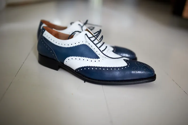 De blauw-witte schoenen van Wouter